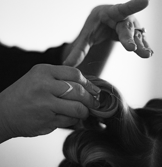 Professional stylist working on hair